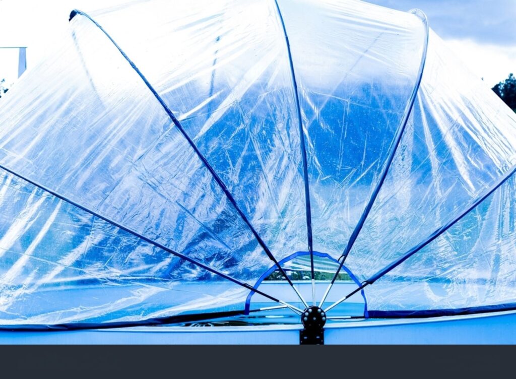 a pool dome, which is a type of swimming pool cover or enclosure.